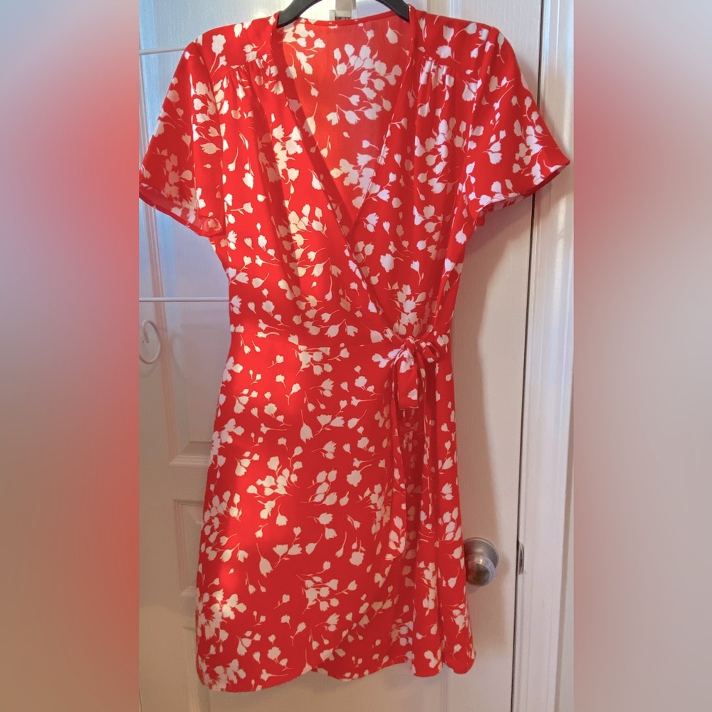 J. Crew orange and white floral wrap dress.